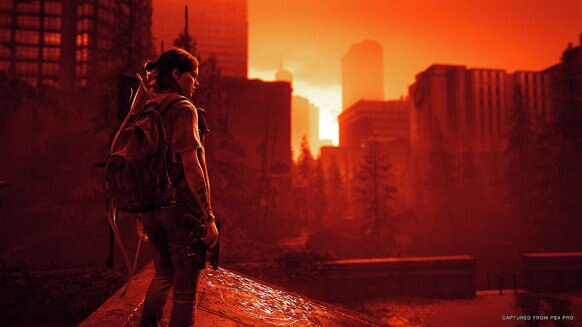 Ellie surveying Seattle in The Last of Us Part II