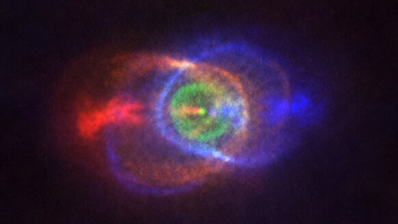 Gas ejected from the binary star system HD 101584 forms an overall hourglass-shaped nebula. Colors represent velocities: Red is away from us, blue toward us, and green neither toward nor away. Credit: ALMA (ESO/NAOJ/NRAO), Olofsson et al.