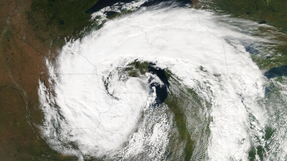  Aqua satellite image of a low pressure storm system over the Great Lakes. 