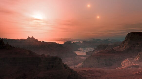 Artwork depicting sunset on a world orbiting a triple red-dwarf system.