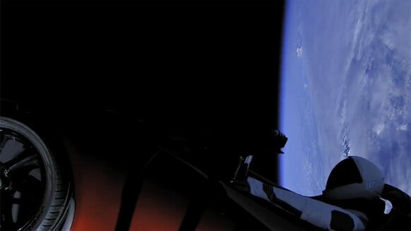 Floating in a tin can: Starman and the Roadster seemingly about to drive to Mars. Credit: SpaceX
