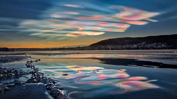 Polar stratospheric clouds over Sweden on December 31, 2019. Credit: Göran Strand, used by permission, from the video