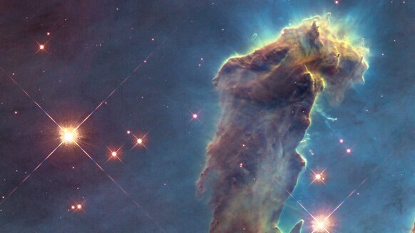 The Pillars of Creation: Towering star-forming clouds of gas and dust in the Eagle Nebula. Credit: NASA, ESA/Hubble and the Hubble Heritage Team (STScI/AURA)