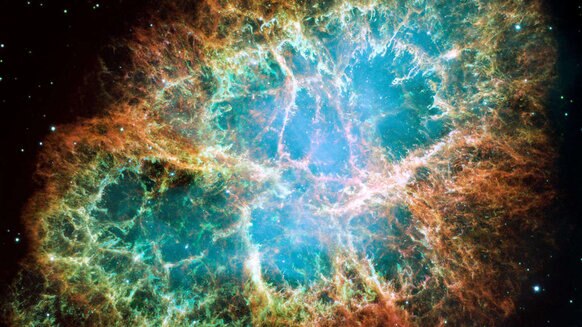 The Crab Nebula, the expanding debris from a supernova explosion, located about 6,500 light years from Earth. Credit: NASA, ESA, J. Hester and A. Loll (Arizona State University)