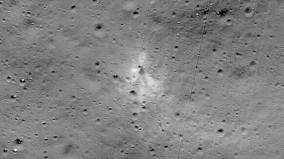 A ratio of the before and after images from Lunar Reconnaissance Orbiter clearly shows the lunar regolith disturbed by the Vikram lander crash. Credit: NASA/GSFC/Arizona State University