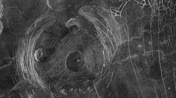 A Magellan spacecraft radar image of Fotla Corona, a volcanic feature on Venus about 150 kilometers wide. Note the circular feature in the middle and the concentric cracks. Credit: NASA/JPL/Magellan probe