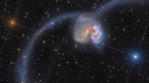 The Antennae Galaxies, a pair of colliding spiral galaxies 45 million light years away. Credit: NASA/ESA/ESO/NAOJ, Rolf Olsen and Federico Pelliccia