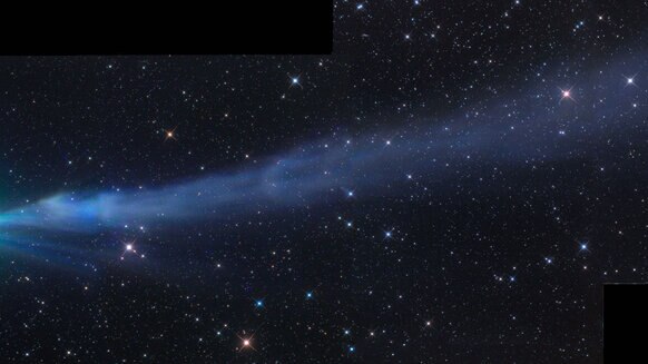 Comet C/2014 Q2 Lovejoy in late December, 2014, shows the diffuse green glow of diatomic carbon around the head, but also a spectacular tail glowing blue (likely also due at least in part to C2) that stretched for millions of kilometers.