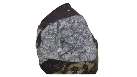 The brecciated structure is apparent after a part of the San Marco meteorite was sawed off. Credit: Demarco et al.