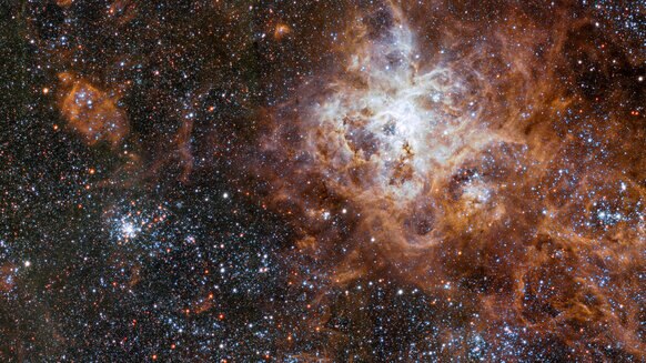 A small section of a huge image of the Tarantula Nebula, a sprawling star-forming gas cloud in a nearby galaxy. Credit: ESO
