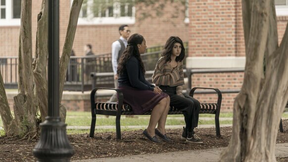 the walking dead world beyond episode 101 Hope and Iris sitting on a bench