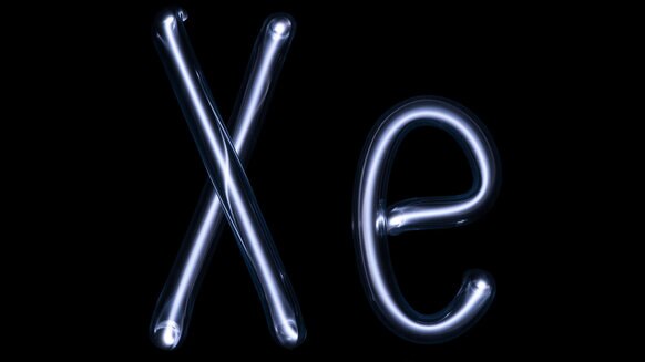 Xenon glows blue when excited by an electric field. These glass tubes, shaped in xenon’s element symbol, are filled with xenon gas. This doesn’t have anything to do with the article, really, but I thought it was fun and clever. Credit: Pslawinski / wikipe