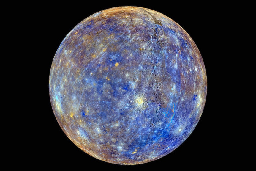 An image of Mercury that represents chemical, mineralogical, and physical differences between the rocks that make up Mercury's surface with colors spanning between blue, brown, and yellow.