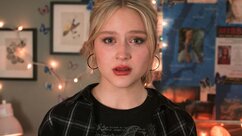 Lexy Cross (Alyvia Alyn Lind) appears in a room with framed artwork on the walls in Chucky 302 -- “Let the Right One In”