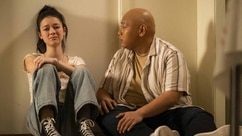 Claire cries on the floor as Reginald Andres consoles her on Reginald the Vampire Episode 204.