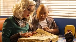 Justineand Reginald Andres read a giant ancient book together in Reginald the Vampire Episode 205.