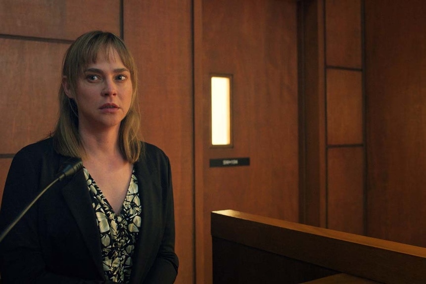 Fiona Dourif as Nica Pierce (Fiona Dourif) appears on a witness stand in court in Chucky 303.