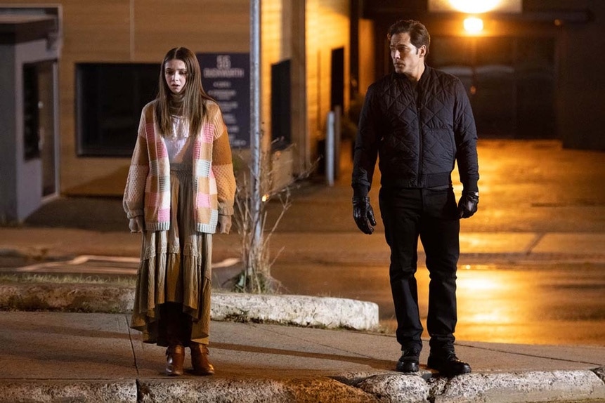 Anya (Maddie Hemeon) and Luke Roman (Tim Rozon) walk on the sidewalk in SurrealEstate 209.