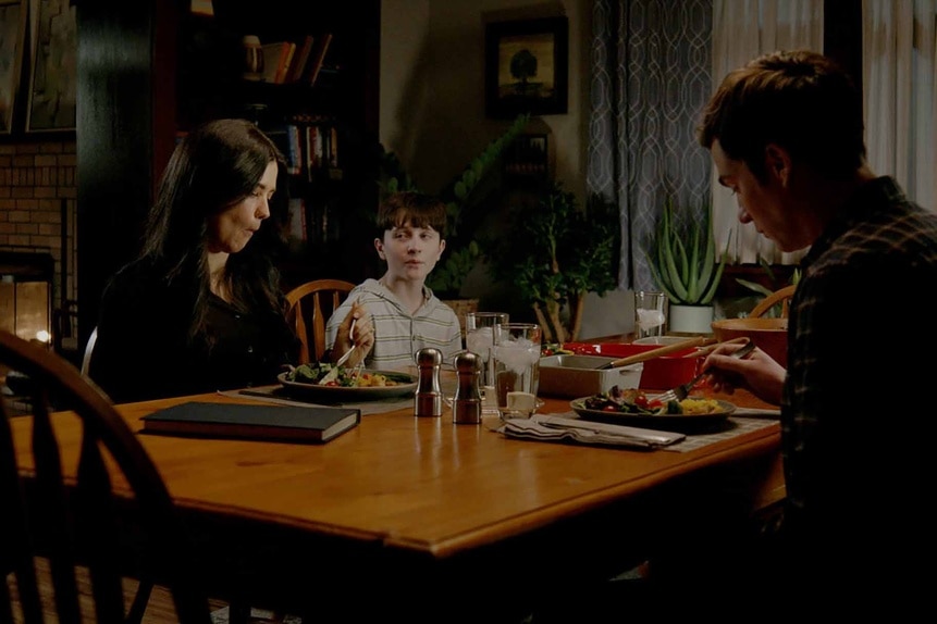 The Hawthorne family has dinner together in Resident Alien Episode 304.