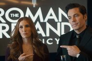 (l-r) Susan Ireland (Sarah Levy) and Luke Roman (Tim Rozon) point at each other in front of a "The Roman and Ireland Agency" sign in SurrealEstate 210
