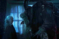 Omi (Krista Stadler) faces a giant horned and clawed Krampus in Krampus (2015).
