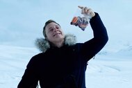 Harry Vanderspeigle (Alan Tudyk) holds up a snack bag in the snow in Resident Alien 216.