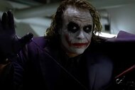 The Joker (Heath Ledger) appears in his iconic makeup in The Dark Knight (2008).