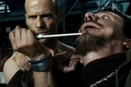 Frank Martin (Jason Statham) holds a screwdiver up to a villain's mouth in Transporter 3 (2008).