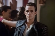 Oliver Pike (Luke Perry) dons slicked back hair and a leather jacket in Buffy the Vampire Slayer.