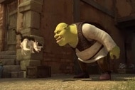 Shrek (Mike Myers) scares a cat who jumps in Shrek Forever After (2010).