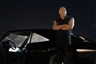 Vin Diesel as Dom in Fast X leans on a car