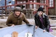 Harry Vanderspeigle (Alan Tudyk) and Liza Vanderspeigle (Taylor Blackwell) move a canoe on Resident Alien Episode 405.