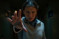 Millie Bobby Brown doing Eleven's hand motion on Stranger Things.