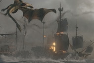 A dragon attacking a fleet of ships during the Battle of the Gullet in the season three premiere of 'House of the Dragon.'