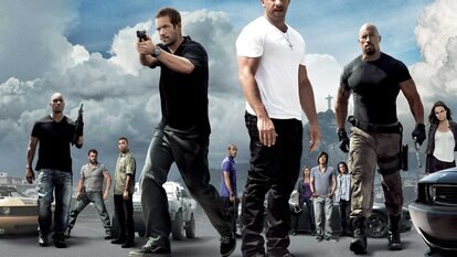 The cast of Fast Five appears in poster art