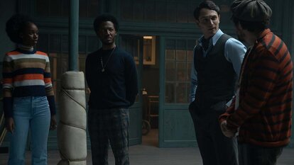 Lou (Jessica Allain), Miles (Hubert Point-Du Jour), Young Winston Scott (Colin Woodell), and a man speak in The Continental: From The World of John Wick Season 1