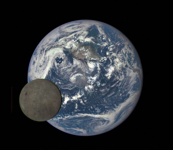 The Earth and Moon seen by the DSCOVR satellite in July 2015. Yes, that's actually the Moon in front of the Earth!