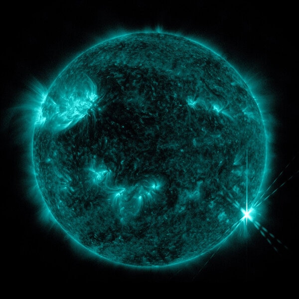 A blue colorized image of a solar flare near Earth captured on April 22, 2022