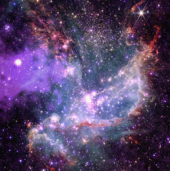 NGC 346 is a star cluster in a nearby galaxy, the Small Magellanic Cloud, about 200,000 light-years from Earth