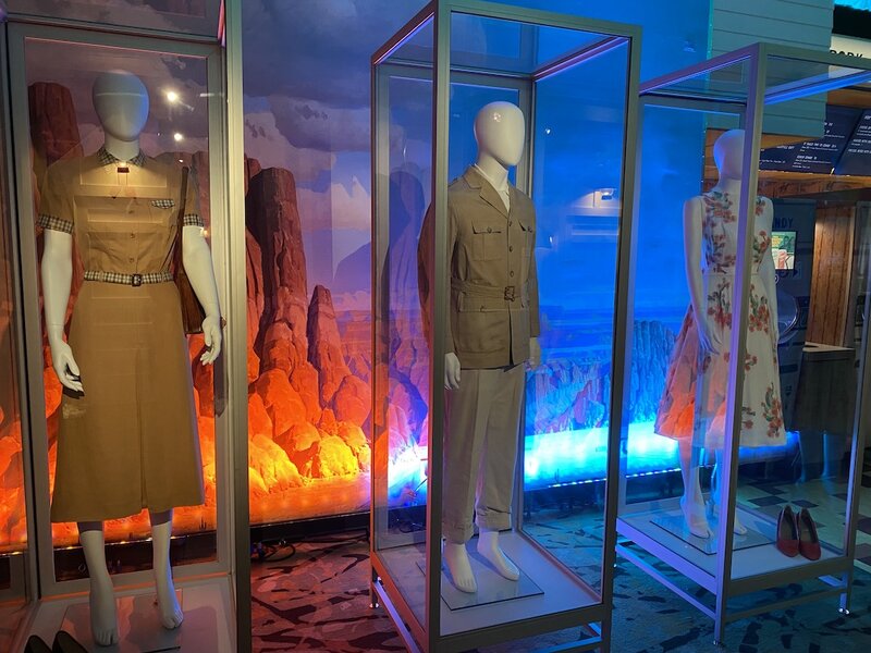 Costumes in display cases as the Asteroid City Pop-Up in Los Angeles