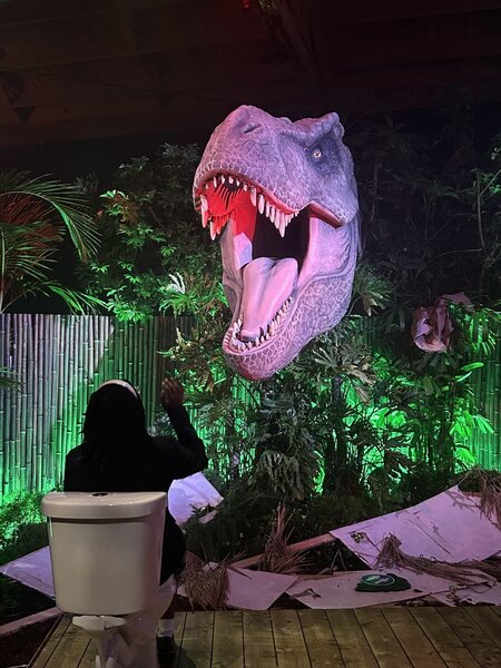 A dinosaur head inside the Jurassic Park 30 Year Anniversary Activation