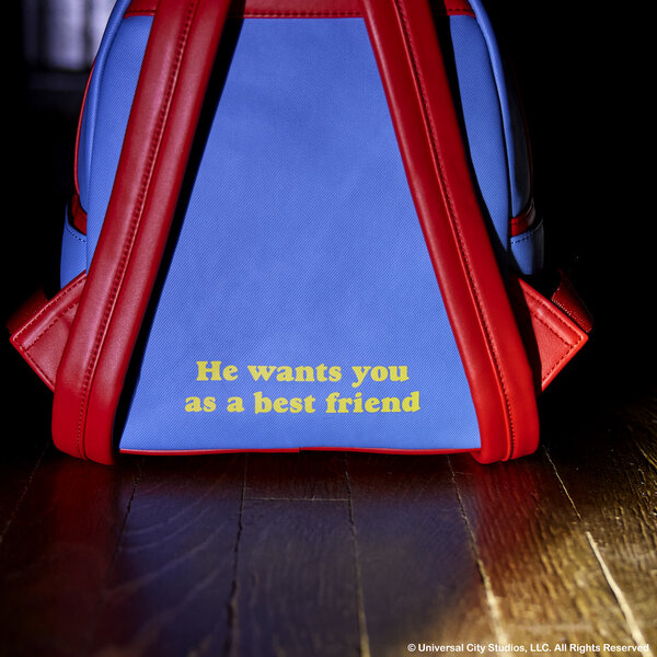 Details of Loungefly's Chucky Backpack that says "He wants you as a best friend"