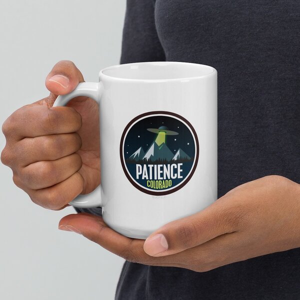 Resident Alien merch mug