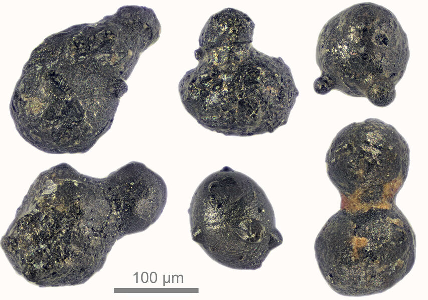 Spherules about the width of a human hair found on a mountain in Antarctica tell a story of a large impact from a 100-meter wide asteroid some 430,000 years ago. Credit: Scott Peterson / micro-meteorites.com