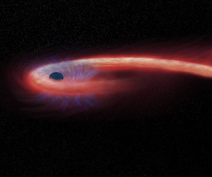Artwork depicting a black hole eating a star, the ferocious tides tearing the star apart. Credit: NASA/CXC/M.Weiss
