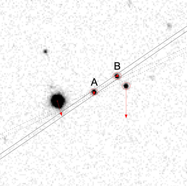 The serendipitous discovery of a binary quasar. The image shows the two objects (A and B) with two stars nearby