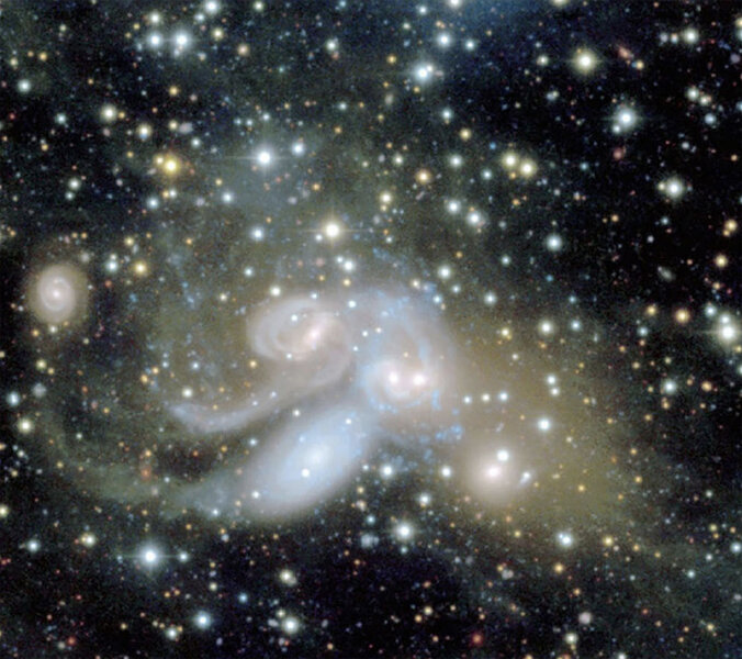 A close-up on the group of galaxies called Stephan’s Quintet, with the contrast stretched to show faint diffuse material. Credit: CFHT, Pierre-Alain Duc (Observatoire de Strasbourg) & Jean-Charles Cuillandre (CEA Saclay/Obs. de Paris).