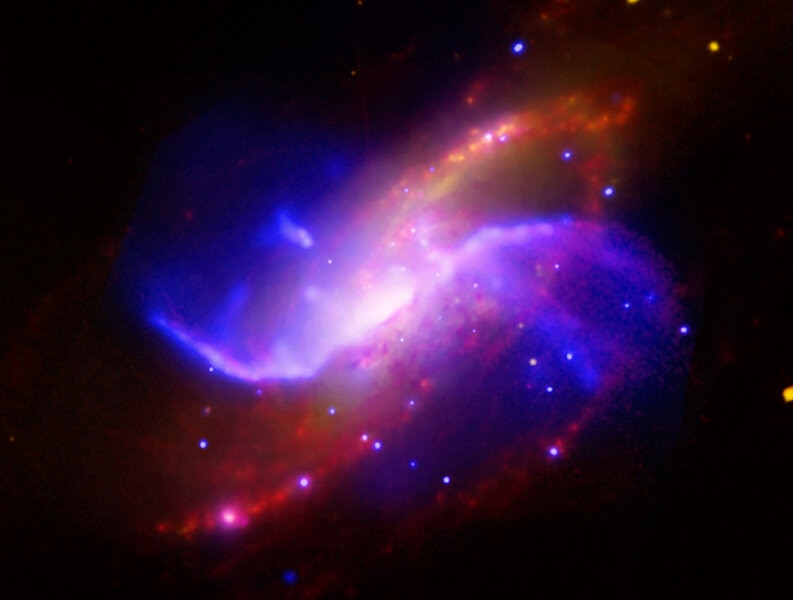 The spiral galaxy M106 has “anomalous arms” that emit X-rays, seen here by the Chandra X-ray Observatory. Credit: NASA/CXC/Univ. of Maryland/A.S. Wilson et al.