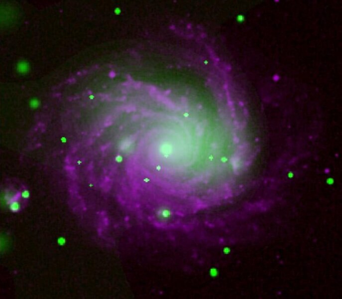 Optical and X-ray observation of NGC 1232 showing the extended gas cloud as well as dozens of point sources, high-energy objects likely located in the spiral galaxy. Credit: NASA/CXC/Huntingdon Inst. for X-ray Astronomy/G.Garmire 