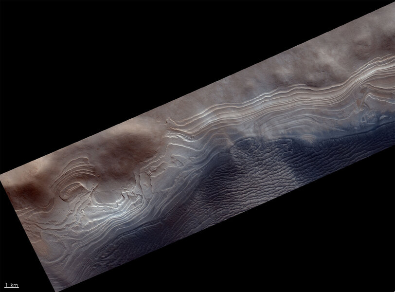 Layered deposits of ice and dust near the south pole of Mars. Credit: ESA/Roscosmos/CaSSIS, CC BY-SA 3.0 IGO